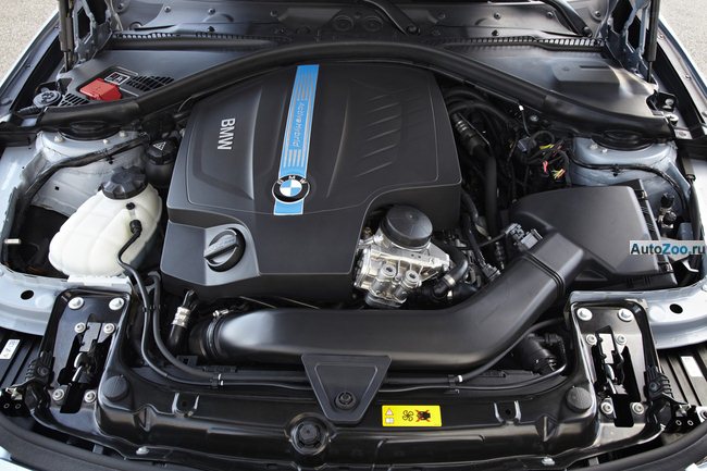 седан BMW 3 с гибридным двигателем фото 13